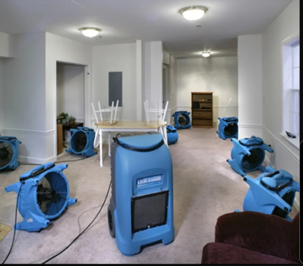 Air movers and dehumidifier setup for Water Damage Restoration in Langley Park